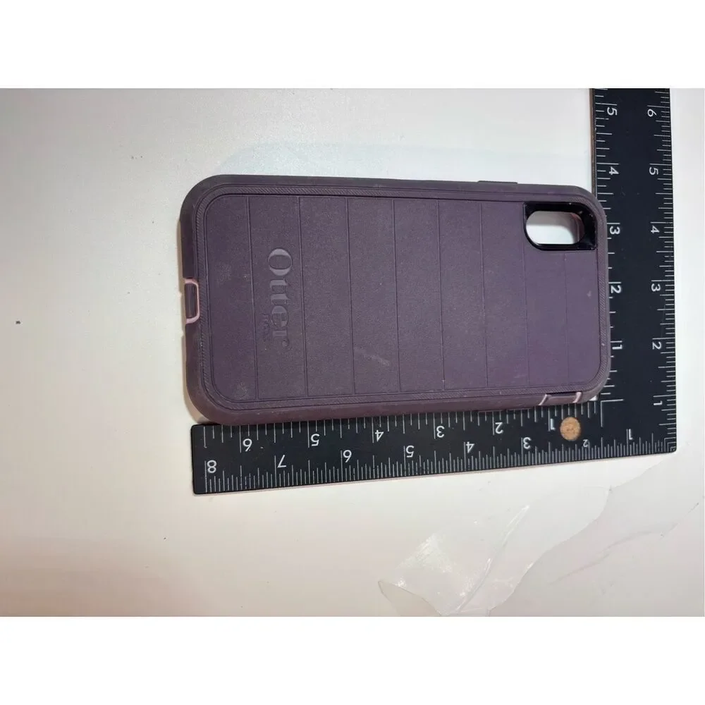 OtterBox Defender Pro case in purple with light pink accents. Designed for iPhon